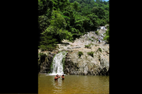 Couple Wading in Quebrada Valencia Waterfalls Santa Marta Colombia